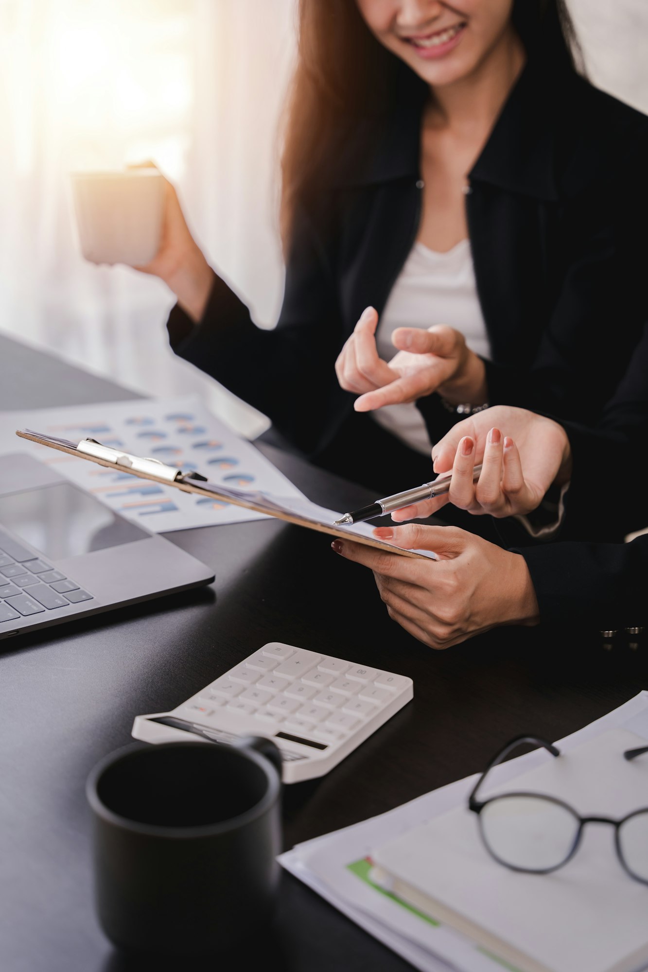The financiers are calculating personal taxes for their customers.
